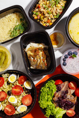 Variety of clean dieting foods in plastic package , top view. Healthy clean food concept.