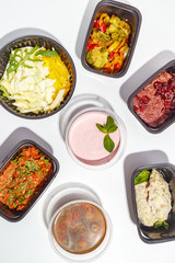 Variety of clean dieting foods in plastic package , top view. Healthy clean food concept.