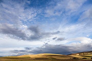 Fototapeta premium Andean Farmland and a beautifull sky. Sacred valley of the Incas, Cusco, Peru.