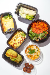 Variety of clean dieting foods in plastic package , top view. Healthy clean food concept.
