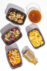 Variety of clean dieting foods in plastic package , top view. Healthy clean food concept.