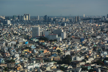 Aerial view of cityscape in sunny day