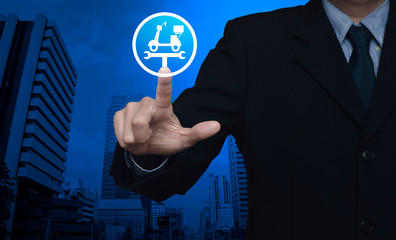 Businessman pressing service fix motorcycle with wrench tool flat icon over modern office city...