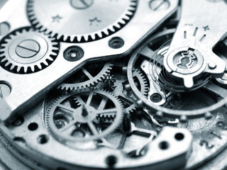 close up macro pic of vintage watch mechanism gears