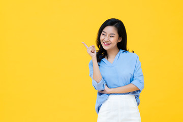 Asian woman pointing her finger to confirm