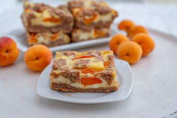 home made apricot cheesecake with chocolate crumble