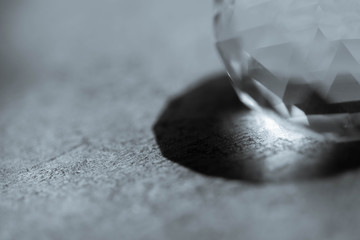 close up of glass cube with shadow as abstract background