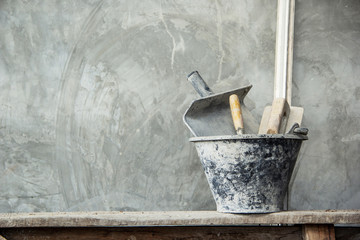 Set Plastering tools concrete to build wall with Gyan plaster, trowel concrete in basket on...
