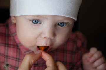 Woman with eating baby.