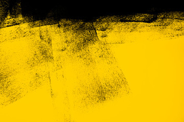 Fototapety  yellow and black paint  background texture with brush strokes