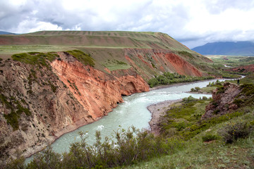 Top view of the Naryn River flowing through a mountain gorge