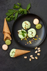 Balls of pistachio ice cream.  Top view