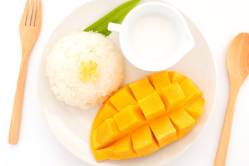 Thai sweet sticky rice with mango. Thai style tropical dessert, glutinous rice eat with mango.