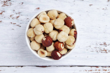A bowl with shelled hazel nuts