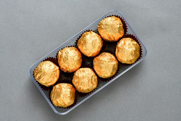 top view of delicious golden premium chocolate sweets