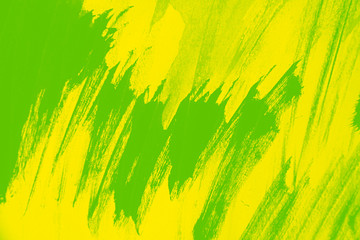 Fototapeta premium yellow green paint background texture with grunge brush strokes