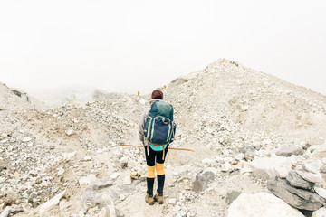 Hiking in Himalaya. Woman Traveler in the Mountains