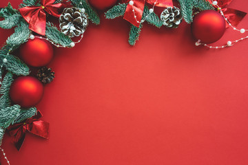 Christmas composition.  Background  red colors with decorations.  Christmas, winter, new year concept. Flat lay, top view, copy space .