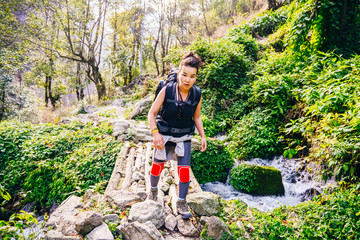 Hiking in Himalaya. Woman Traveler in the Mountains