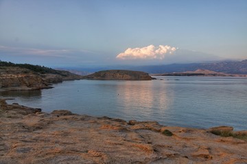 Clouds reflecting in the water on island Rab