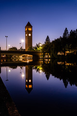 Clock Tower Reflections on River at Twilight