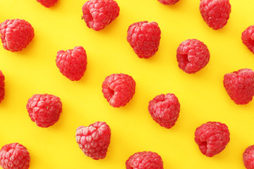 Sweet ripe raspberry on color background