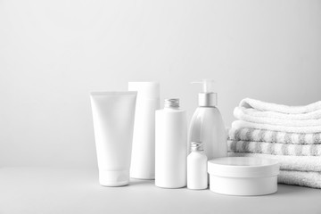 Set of cosmetic products on light background