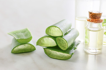 Composition with aloe vera and juice on light background