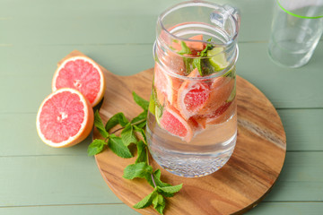 Jug of infused water on table