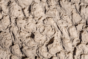 Decorative exterior wall plaster with embossed surface - image