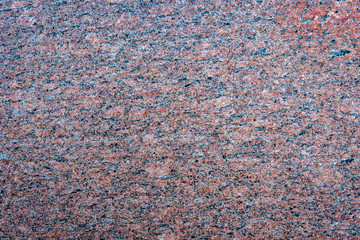 Close up of a gray granite wal tevture - image