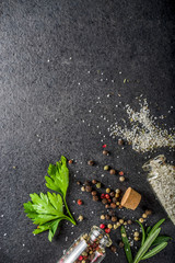 Cooking food background with herbs, olive oil and spices