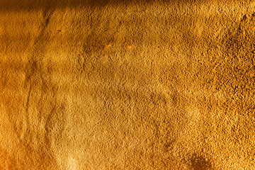 concrete wall texture with golden sunlight and shadow for background