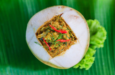 steamed fish and seafood in fresh coconut