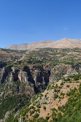 panorama of the village of Bcharre, in Mount lebanon, with the cliff of the saints valley, historical site and refuge for christians during persecution