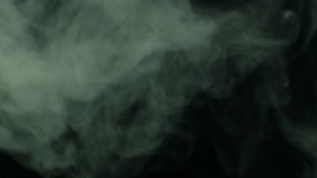 Smoke plumes on black background. Blend in screen mode overlays to add smoke effect to footage.
Smoke swirling around the of the frame from the right to the left
