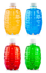 The colored drink in plastic bottle on white background