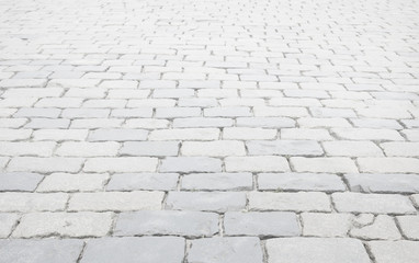 White washed cobblestone pavement background