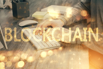 Blockchain theme hud with businessman working on computer on background. Concept of crypto chain....