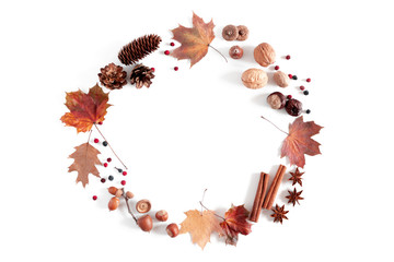 Autumn creative composition. Pattern made of dried autumn leaves, berries, flowers on white...