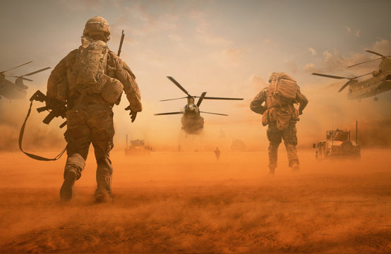 Military troops and helicopter on the way to the battlefield / Between sand storm in desert