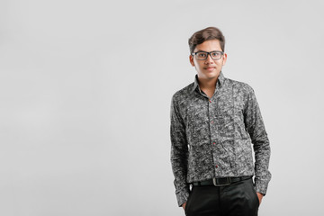 Fototapeta premium Indian / Asian Collage boy in formal dress and wearing spectacles