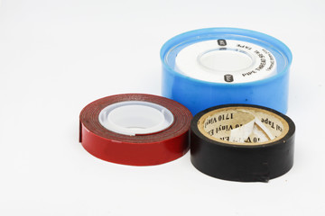 Various adhesive tapes on white