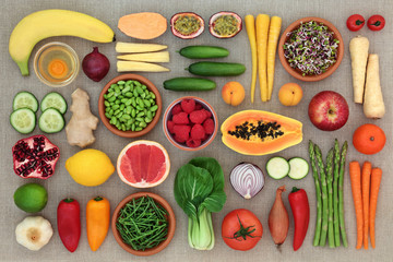 Fototapeta na wymiar Health food for fitness concept with dairy, fresh fruit and vegetables, herbs and spice, super foods high in antioxidants, anthocyanins, vitamins and dietary fibre. 