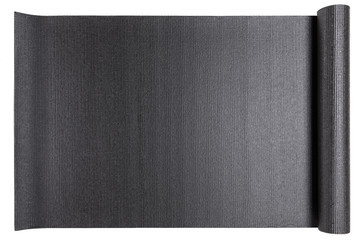 black textured mat for fitness or for yoga, camping for carimat, on a white background, isolate