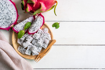 Dragon fruit (Pitahaya, Pitaya) slice on wooden plate