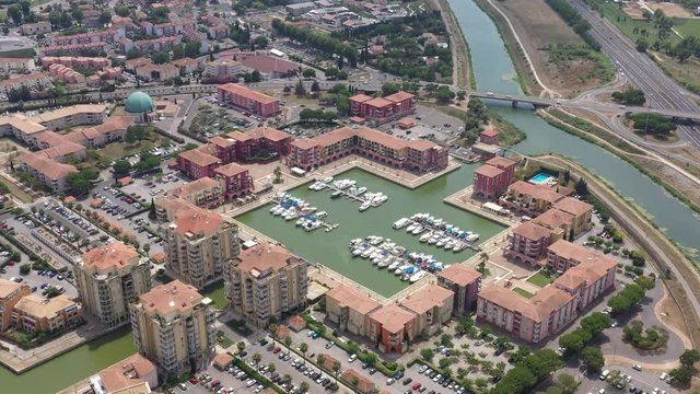 Beautiful aerial view of Port Ariane marina leisure boats and residential buildings houses Lattes Montpellier France