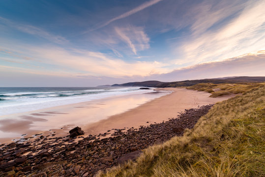 Sandwood Bay in the early morning, with Cape Wrath in far distance, Sutherland, Scotland