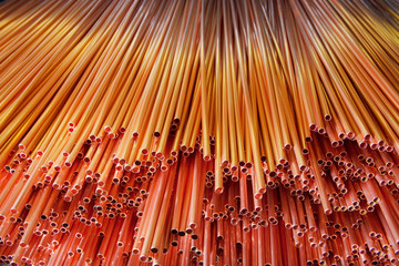 Copper pipes in factory, industrial background