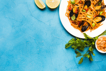 Flat-lay seafood dishes with copyspace